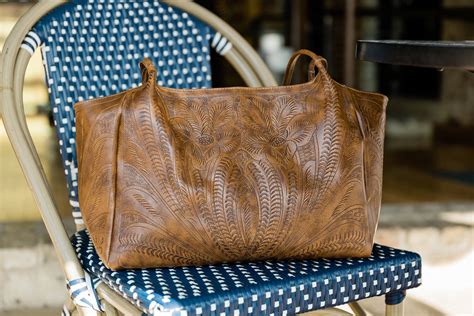leaders in leather handbags
